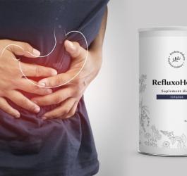 Mężczyzna trzyma się za bolący brzuch. Obok opakowanie ziołowego suplementu diety RefluxoHerbs.